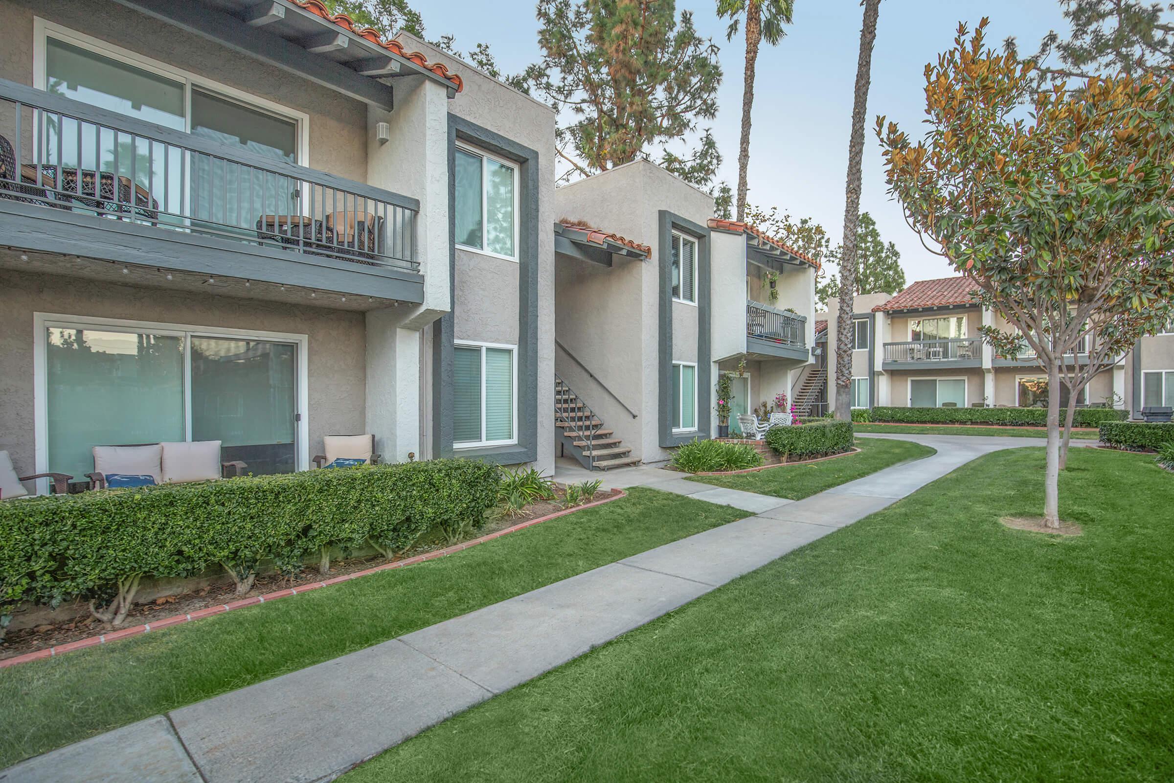 a large lawn in front of a house