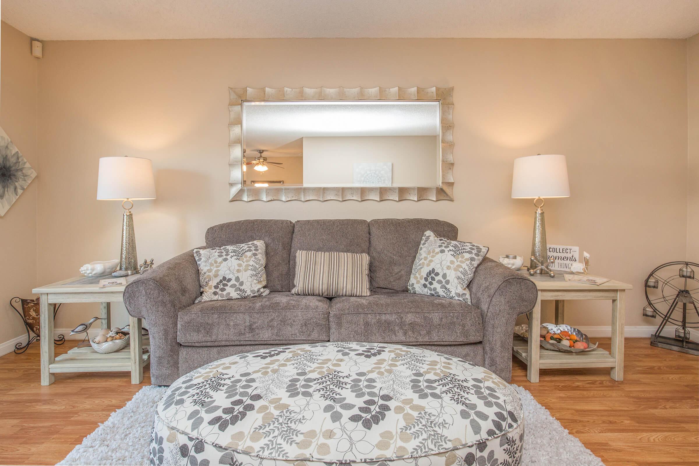 a bedroom with a view of a living room