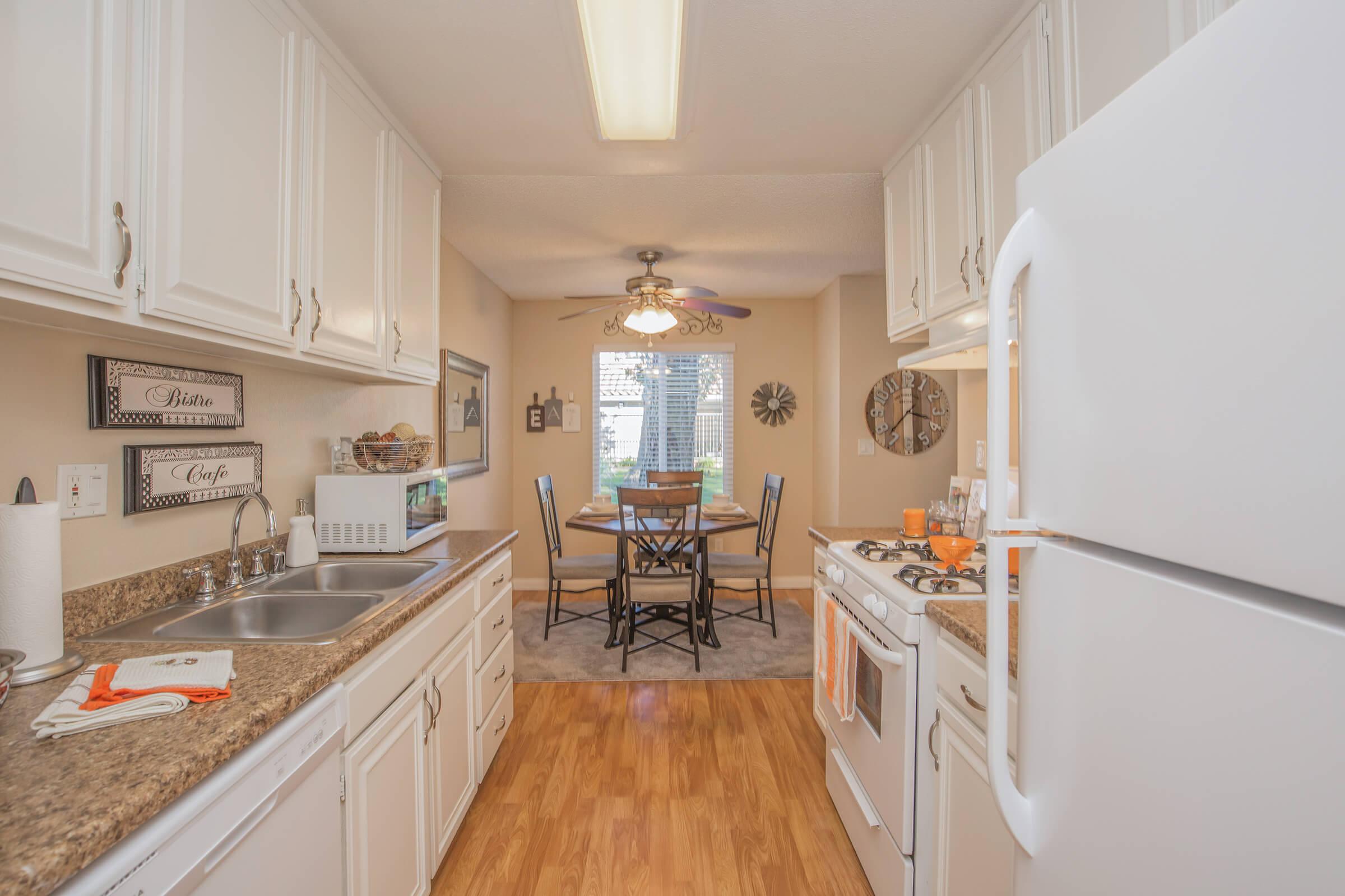 COMPLETE KITCHEN WITH DISHWASHER, PANTRY, AND GRANITE COUNTERTOPS