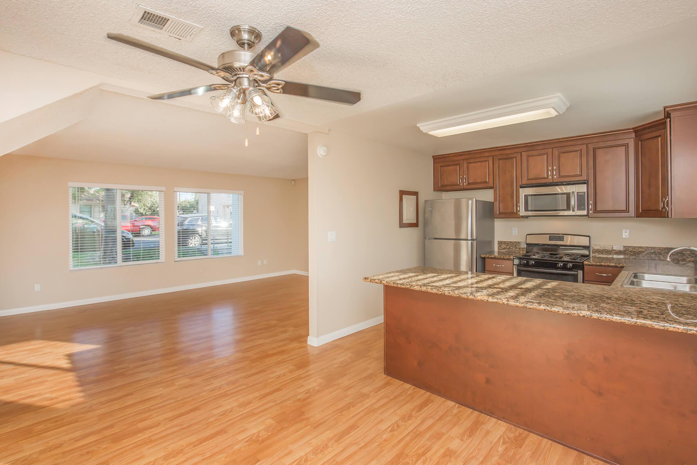 a kitchen with a wood floor