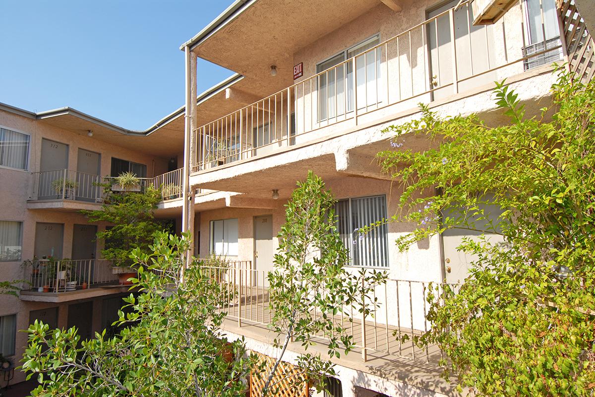 a house with trees in the background