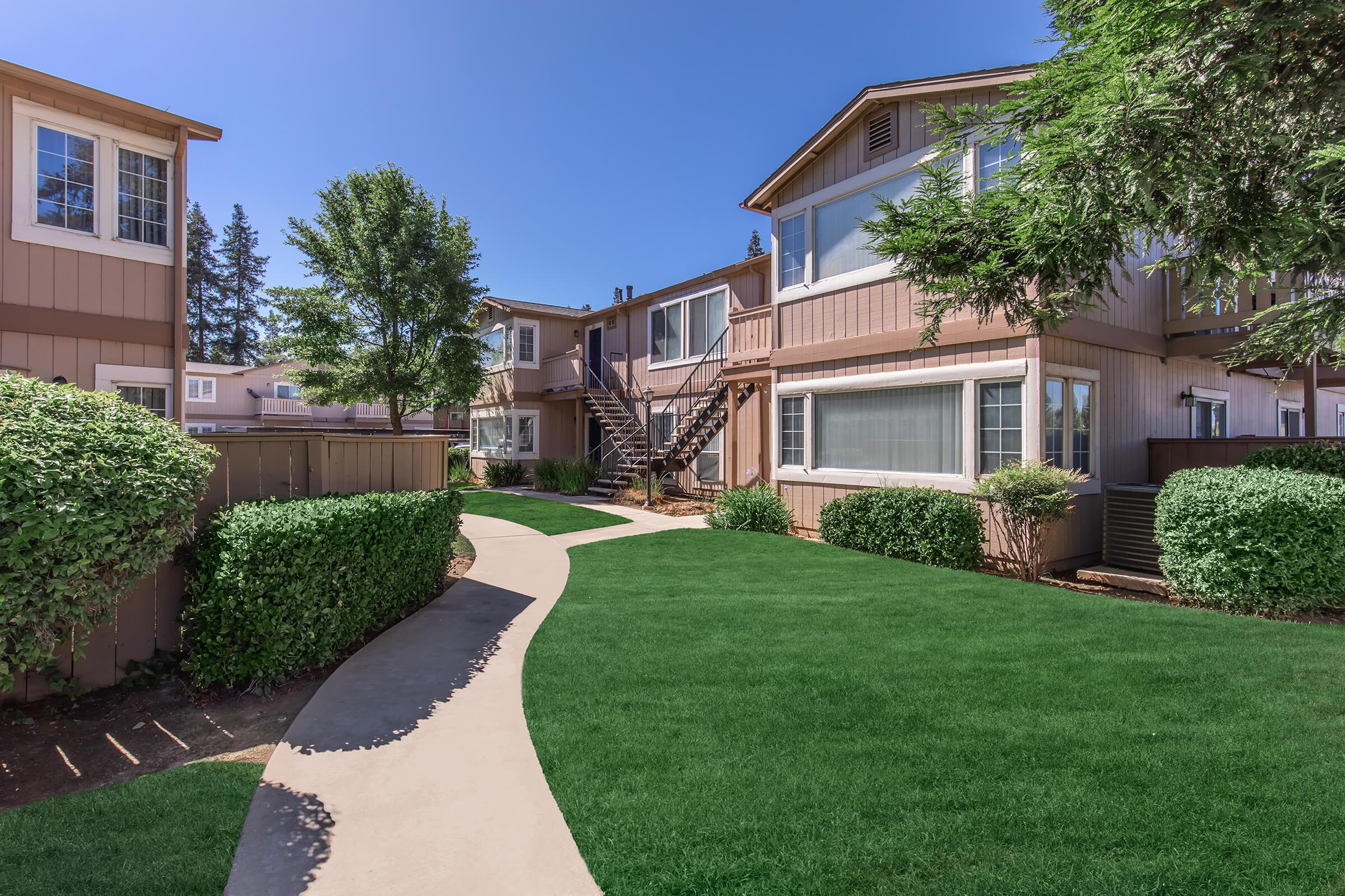 a large lawn in front of a house