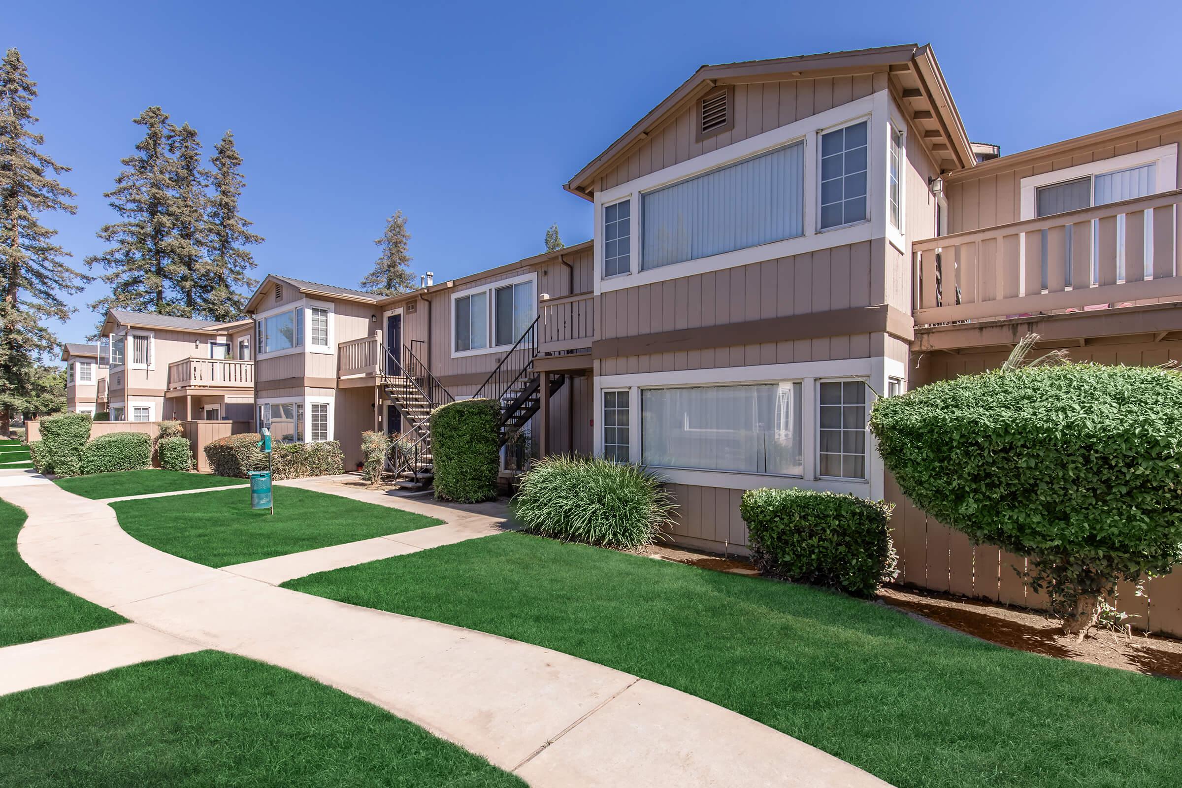 a large lawn in front of a house