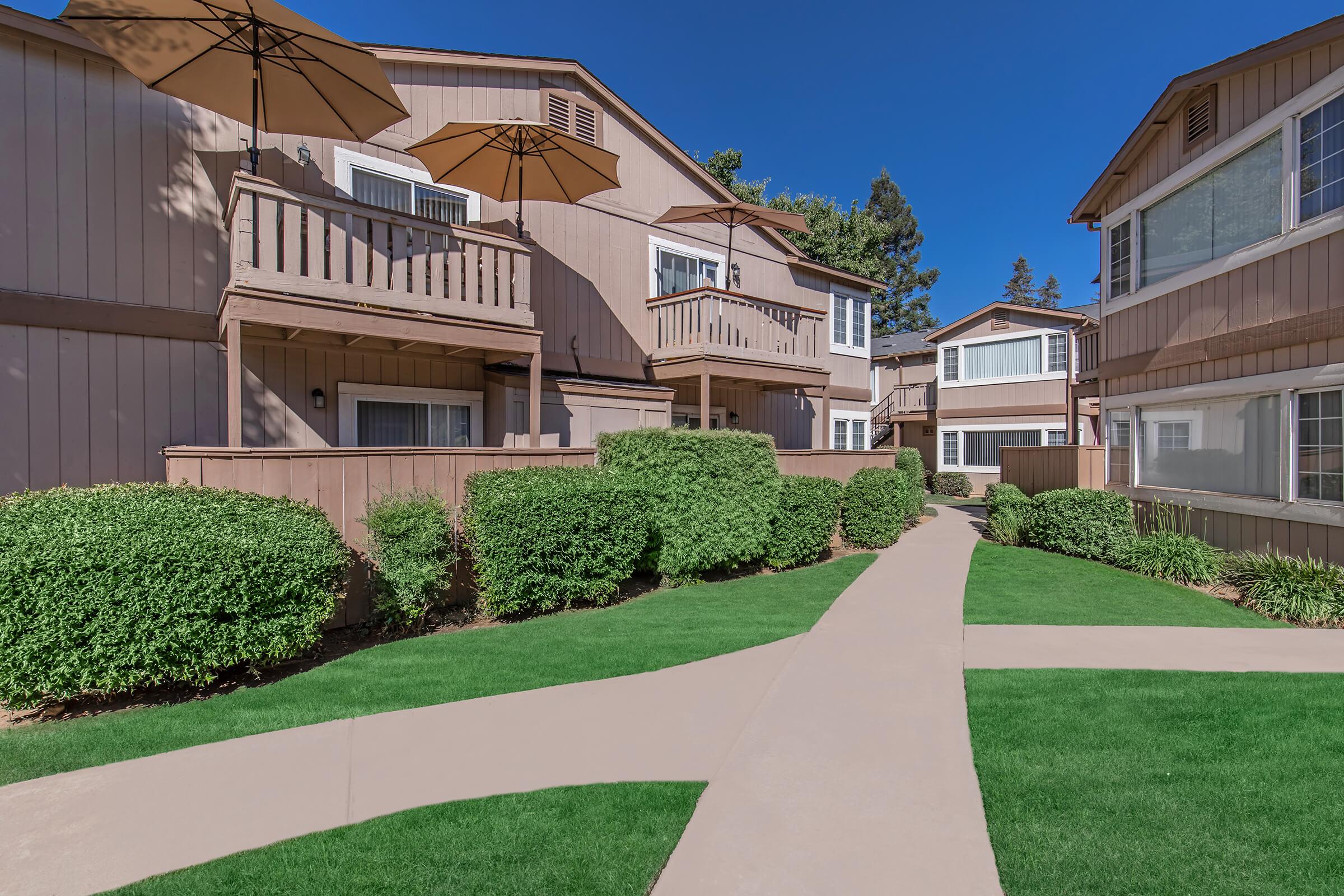 a large lawn in front of a building