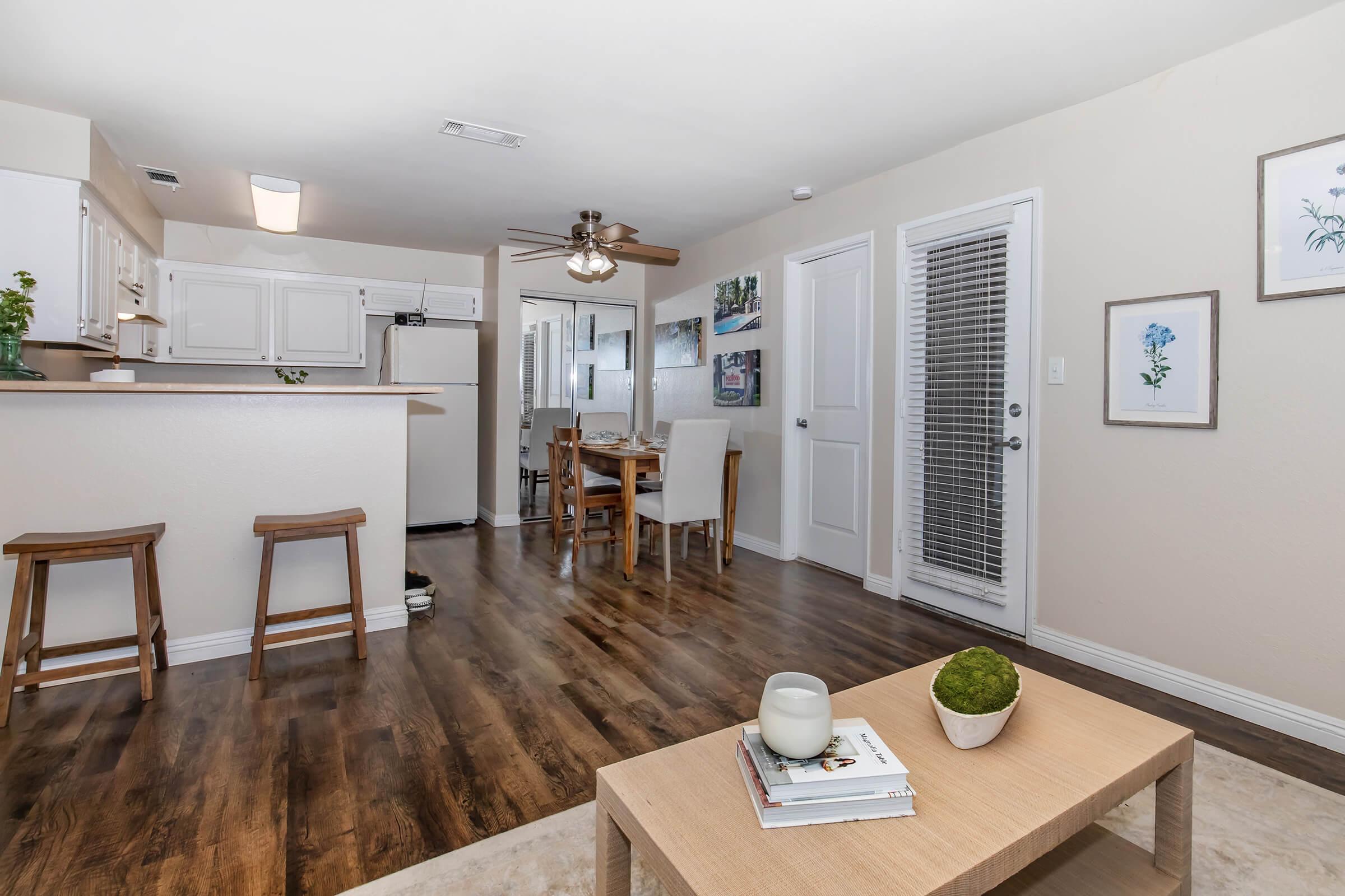 a living room with a wooden counter