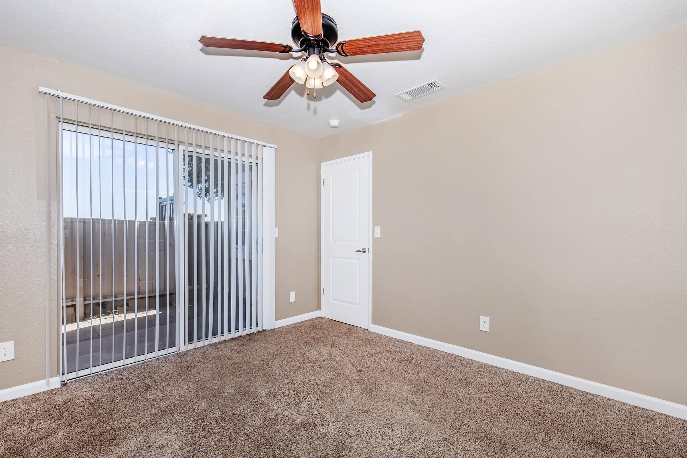 a bedroom with a large window