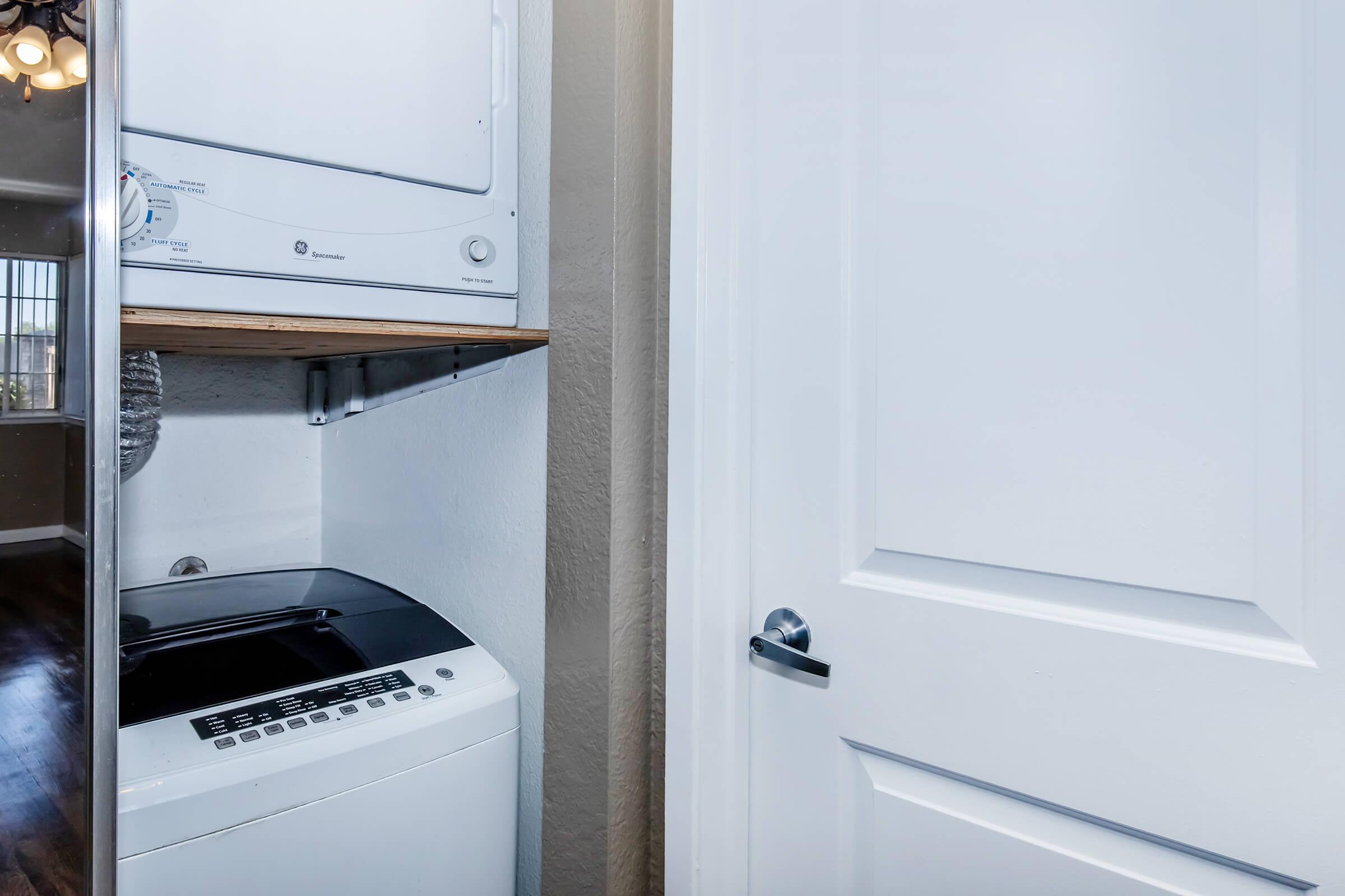 a stove top oven sitting inside of a refrigerator