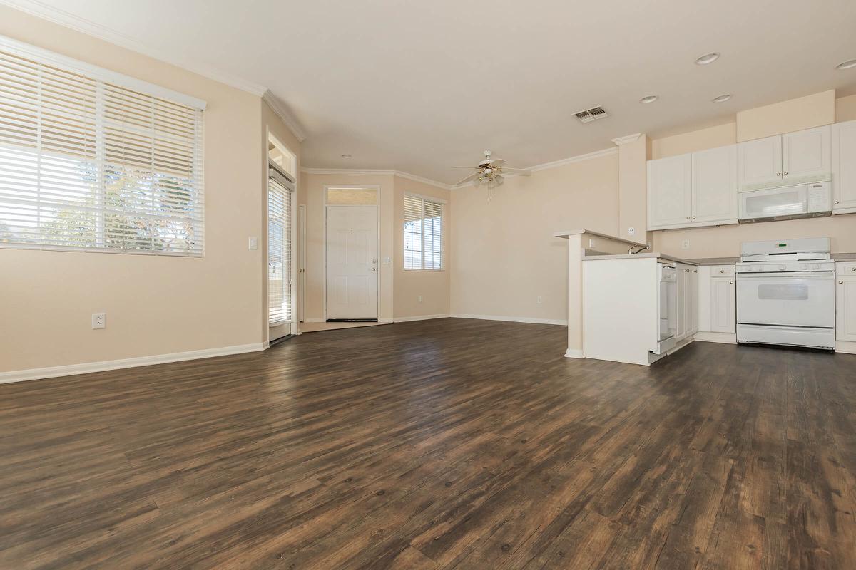 a kitchen with a wood floor