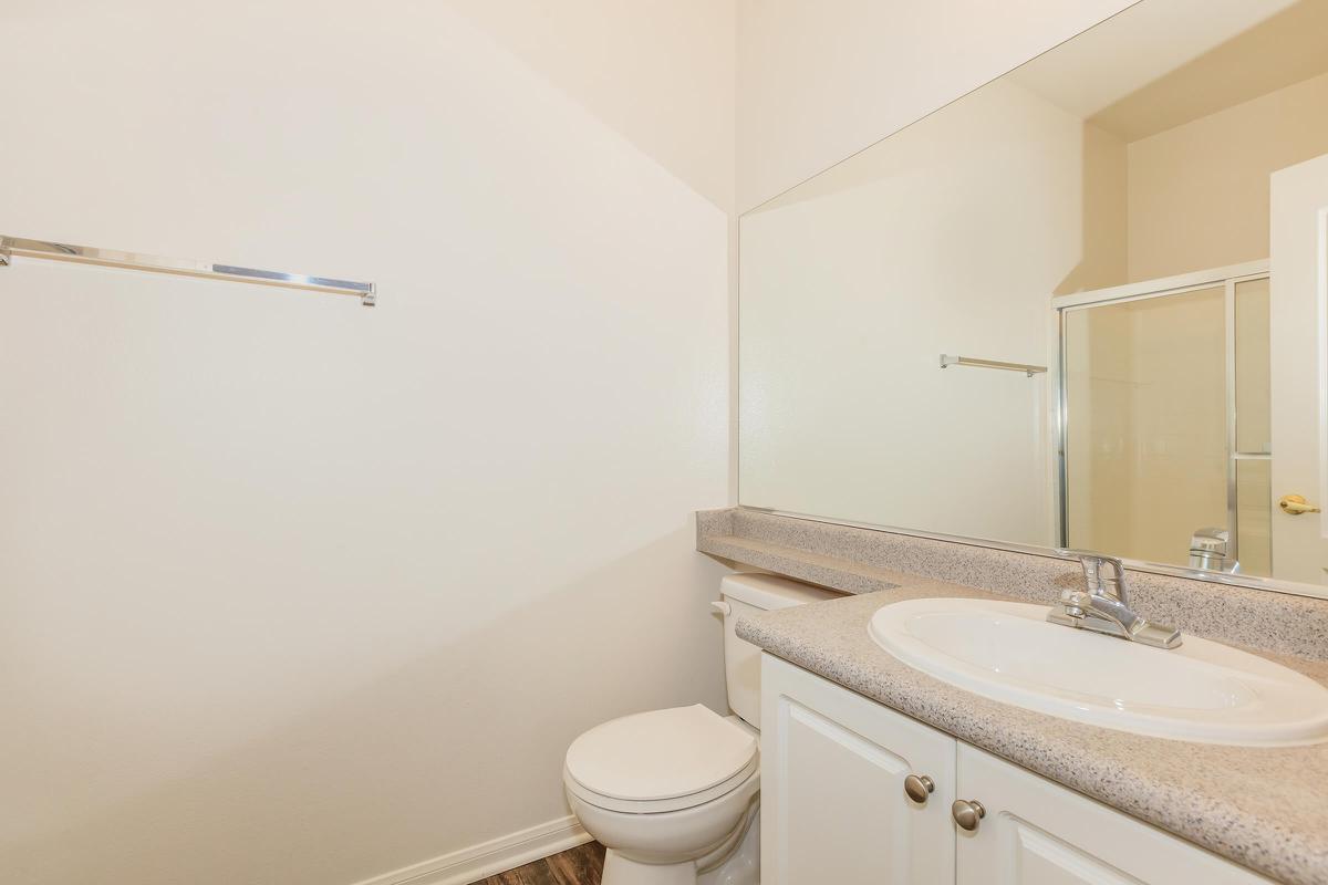 a white sink in a small room