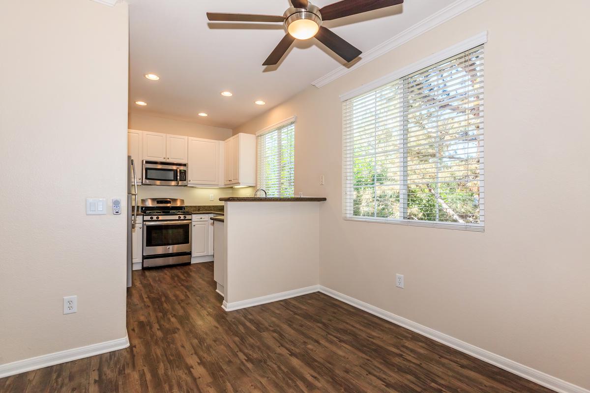 a kitchen with a large window