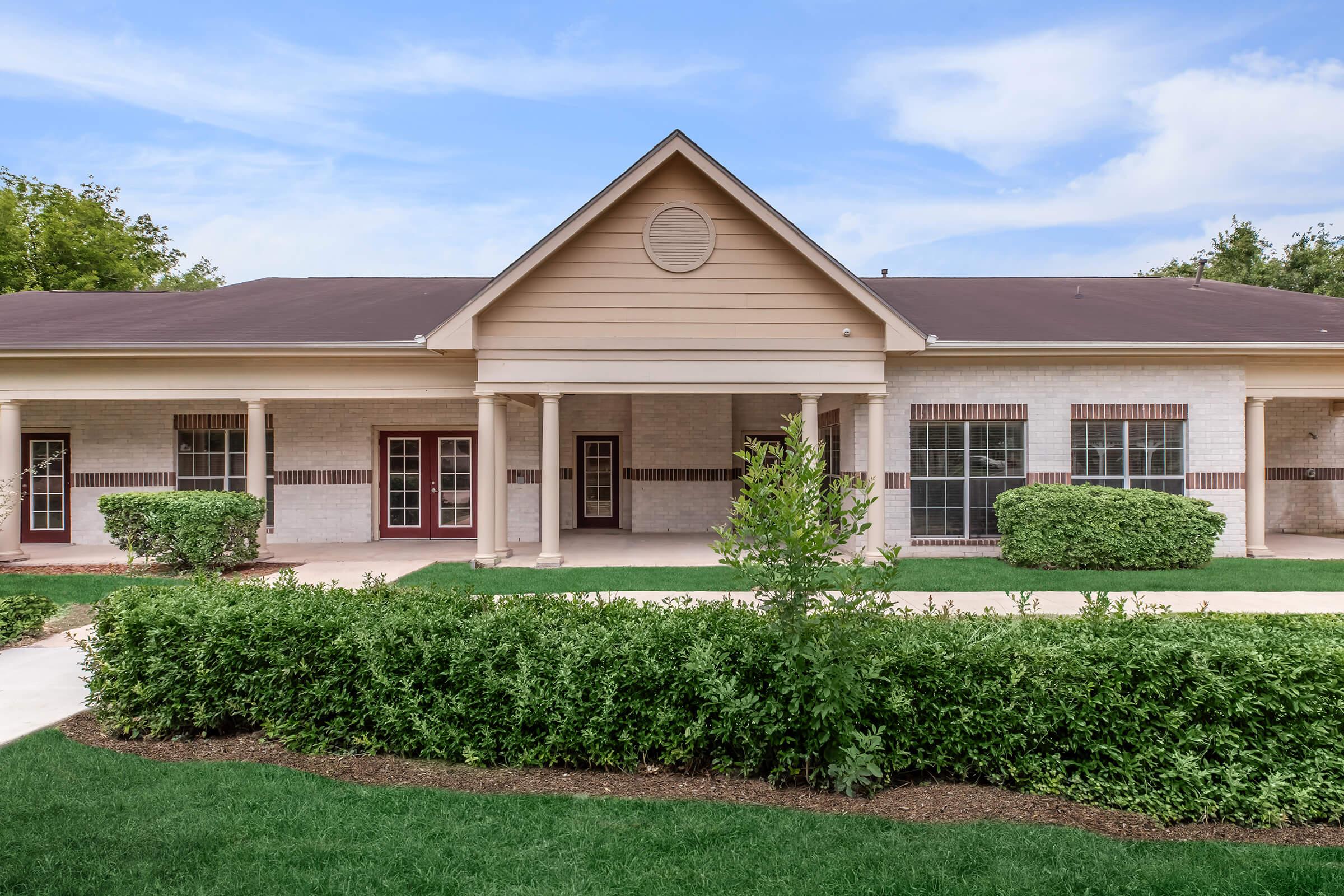 a large lawn in front of a house