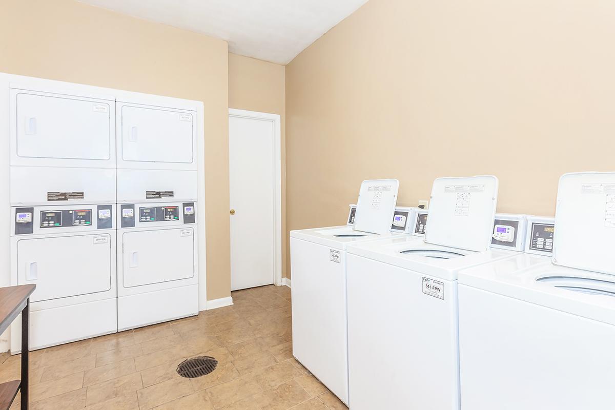 a white refrigerator freezer sitting in a room