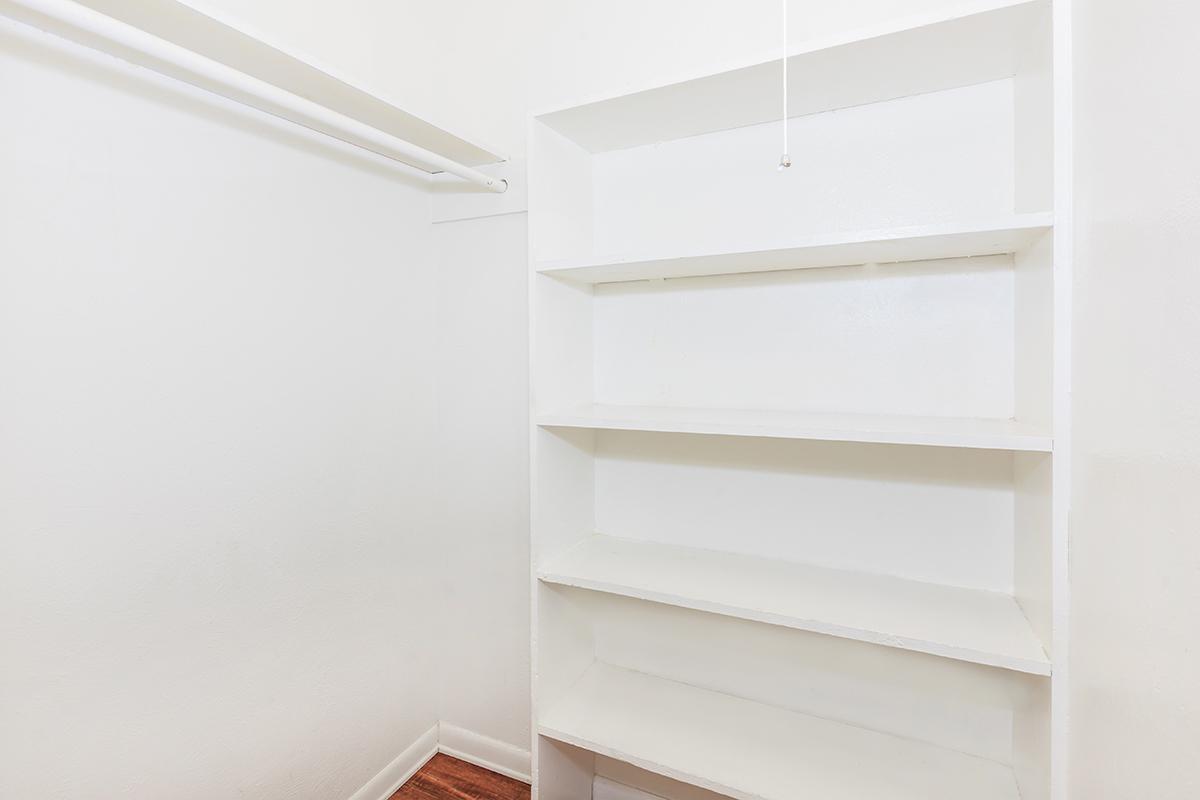 a white refrigerator freezer sitting in a room