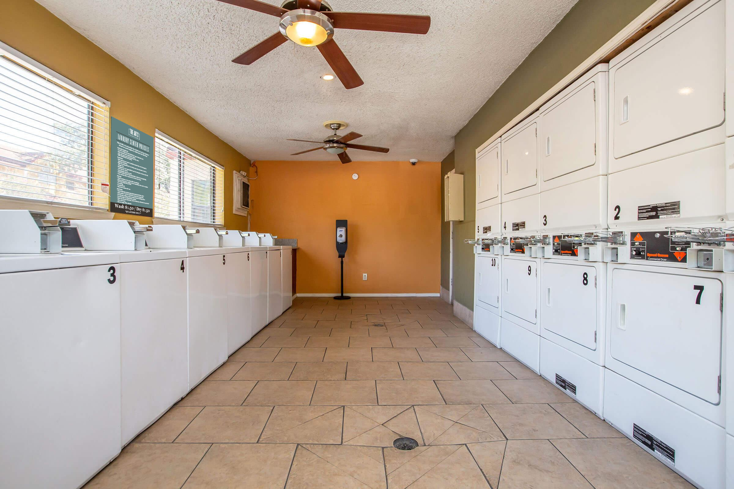 a kitchen with a building in the background