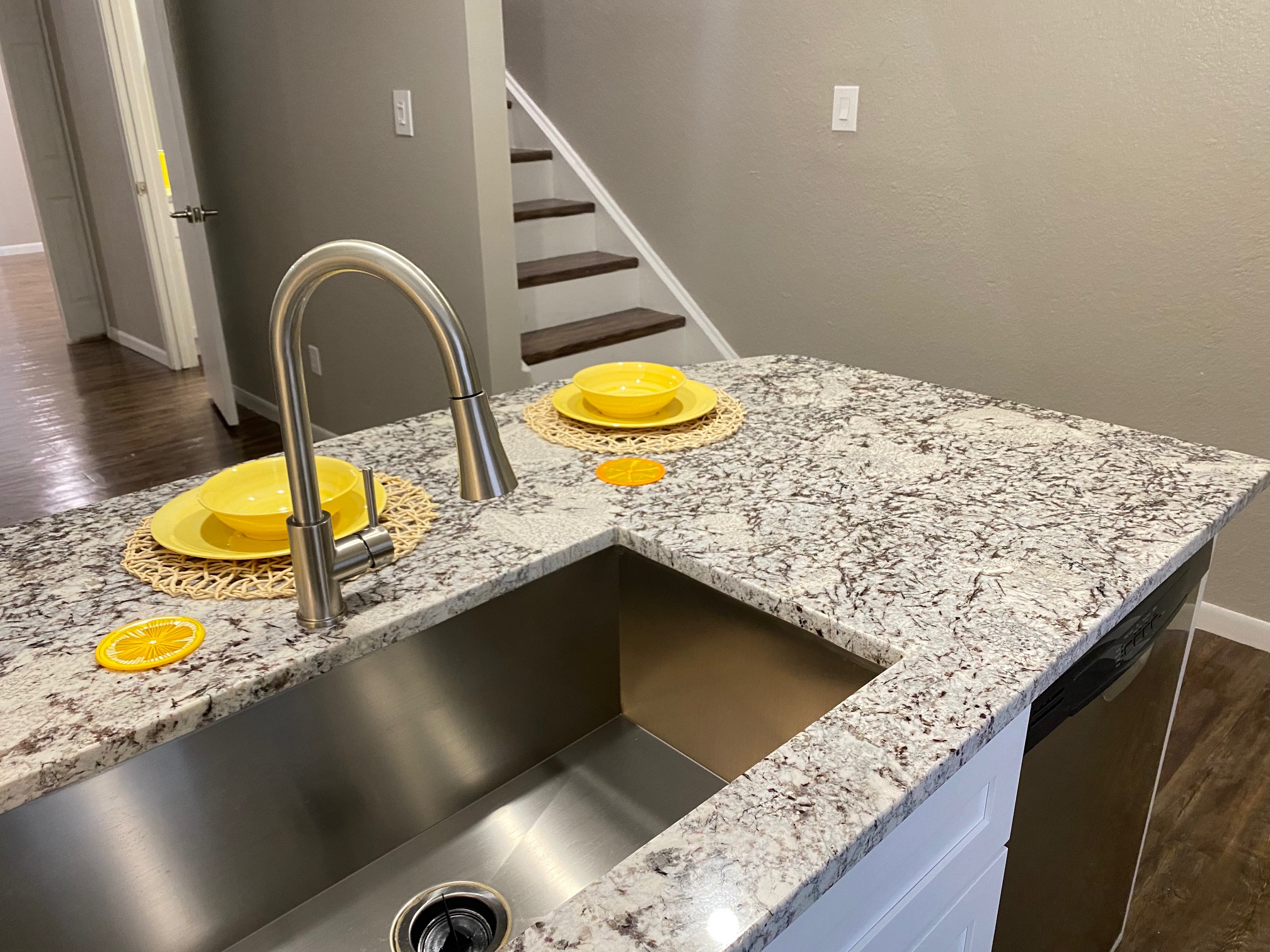 a kitchen with a sink and a counter