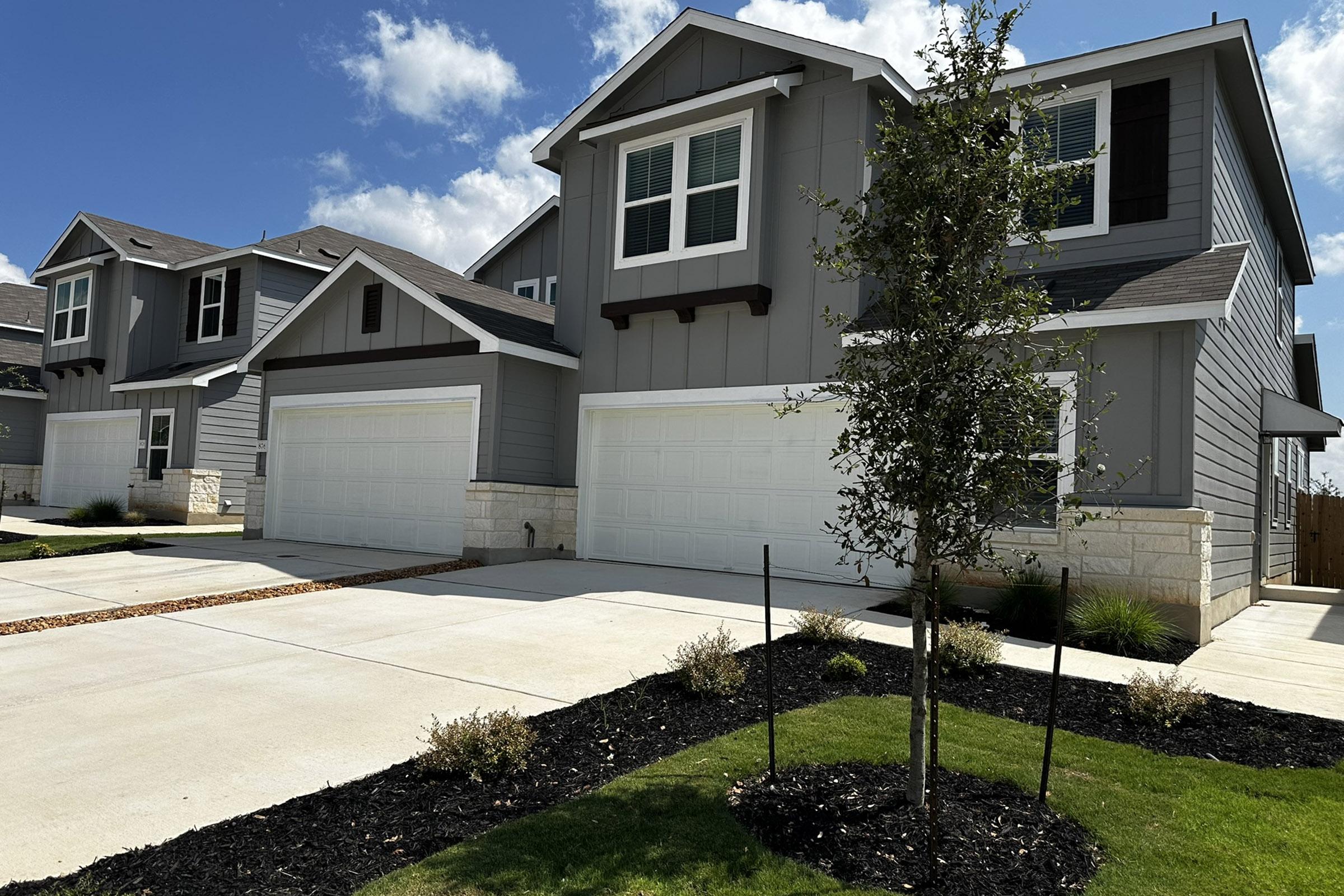 a large lawn in front of a house