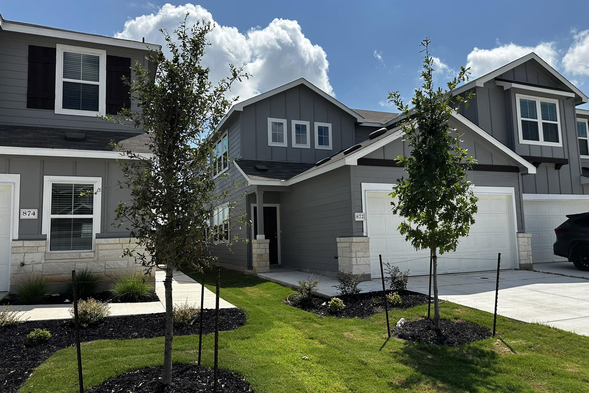 a large lawn in front of a house