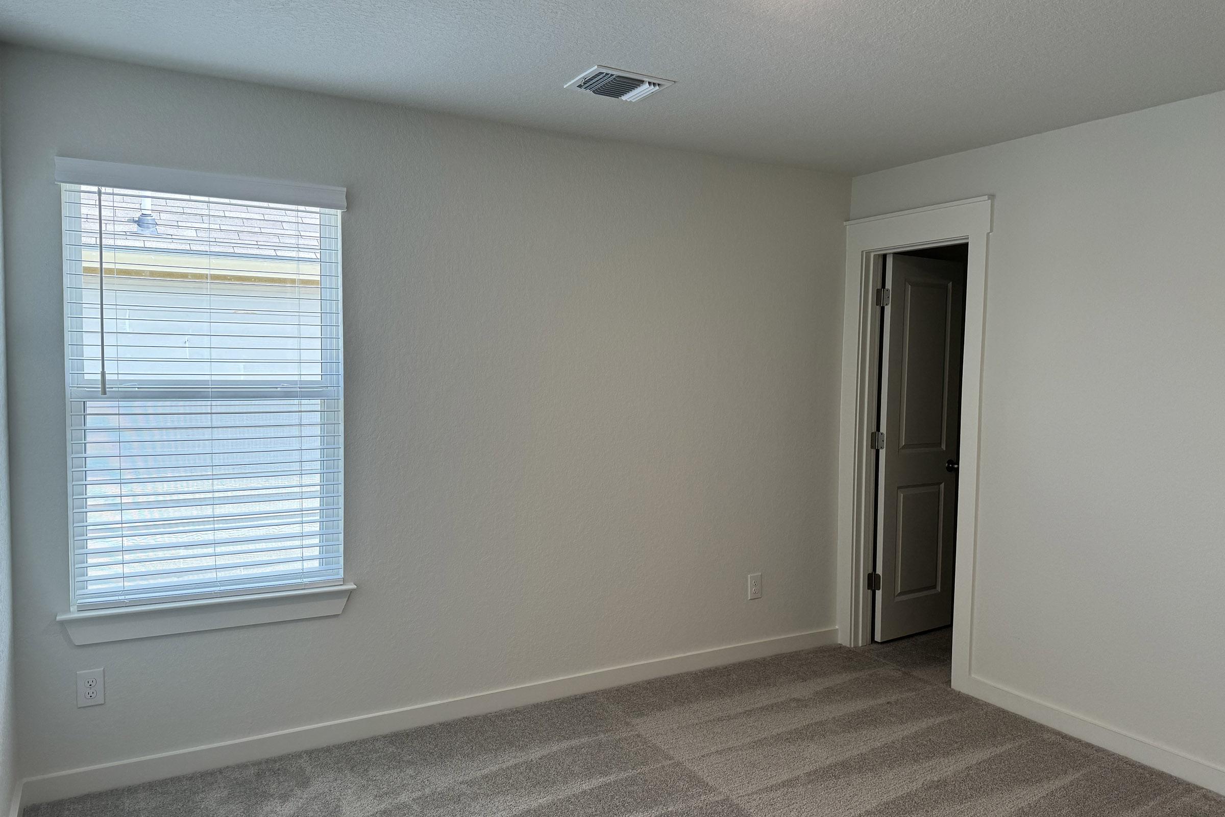 a room with a sink and a window