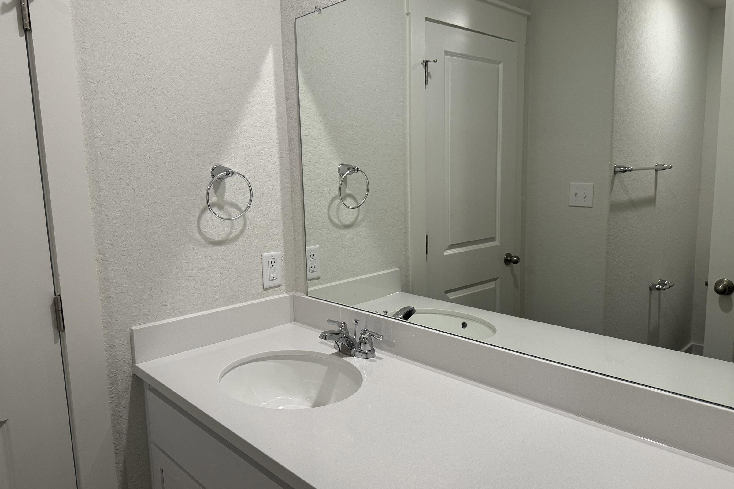 a sink and a mirror