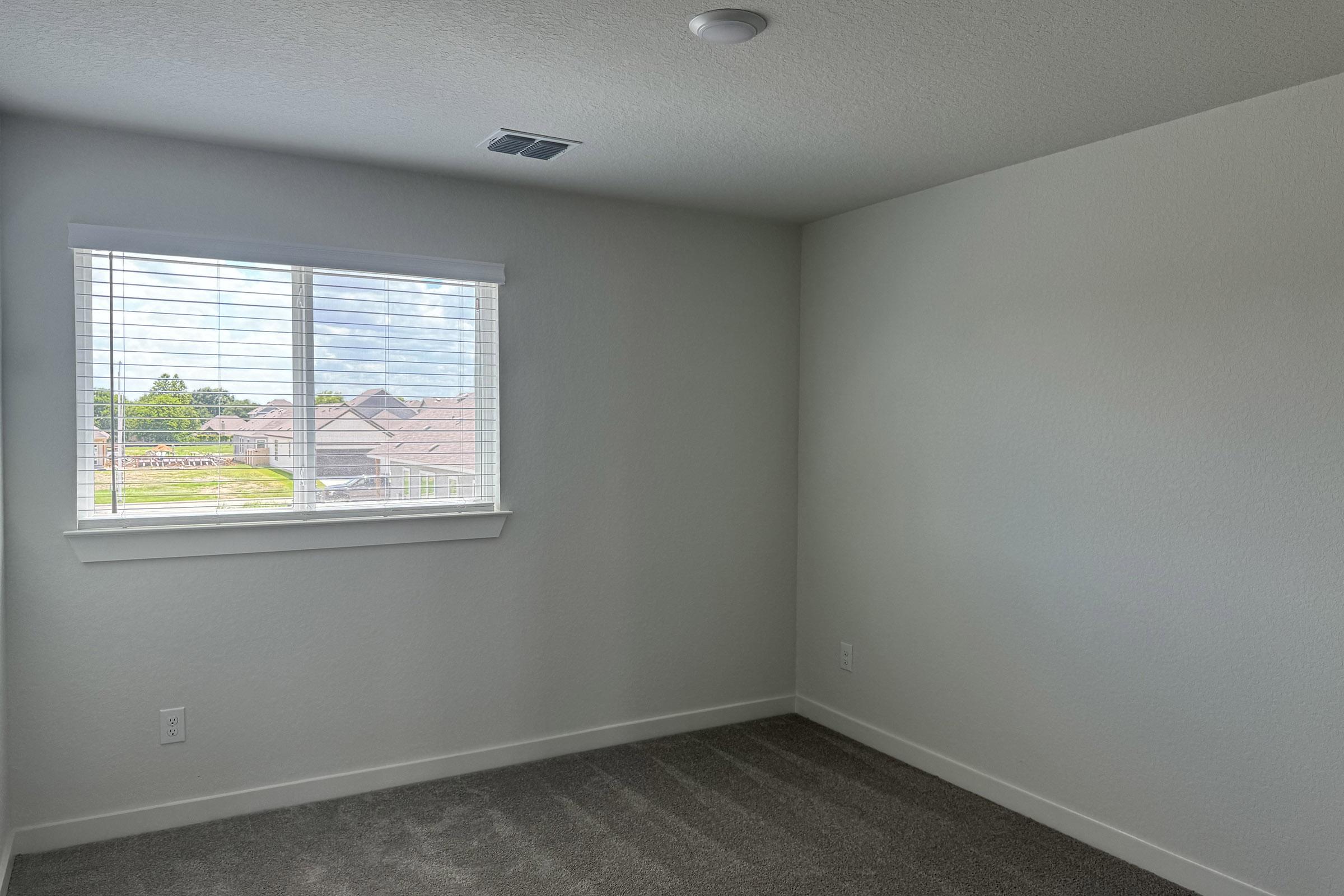 a room with a sink and a window