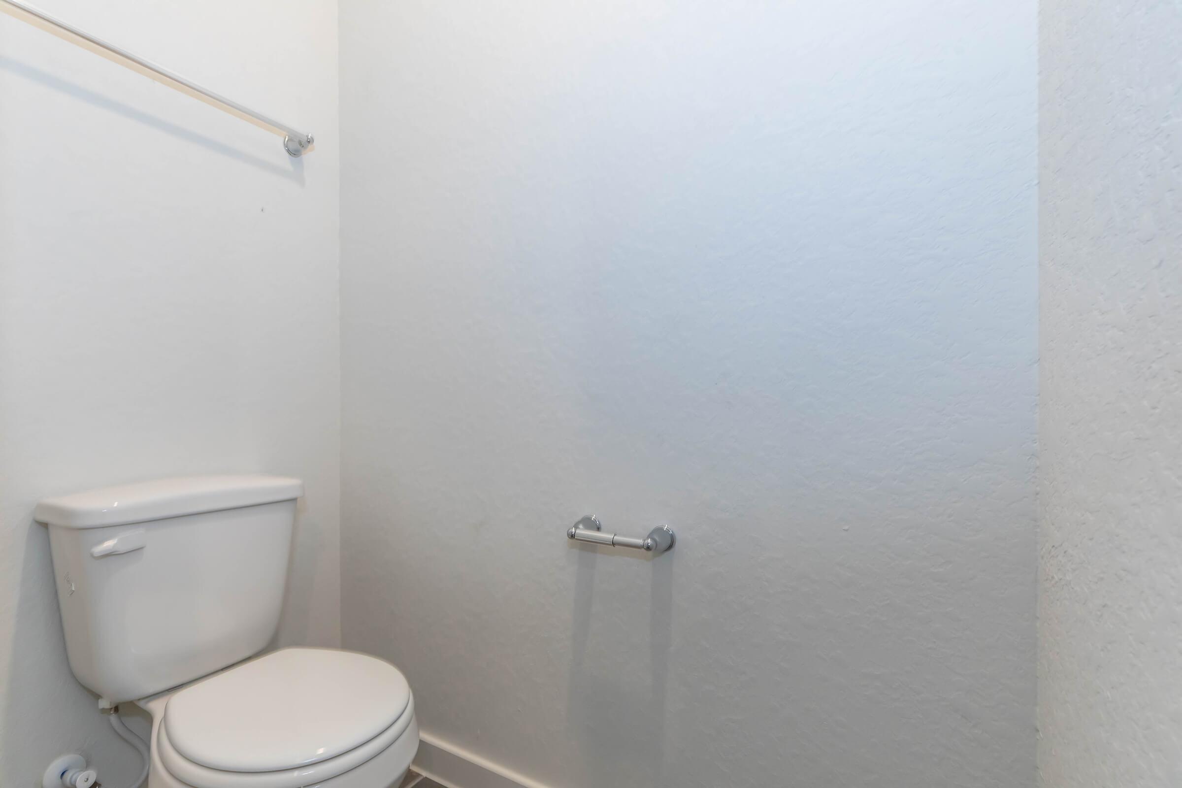 a view of a shower in a small room