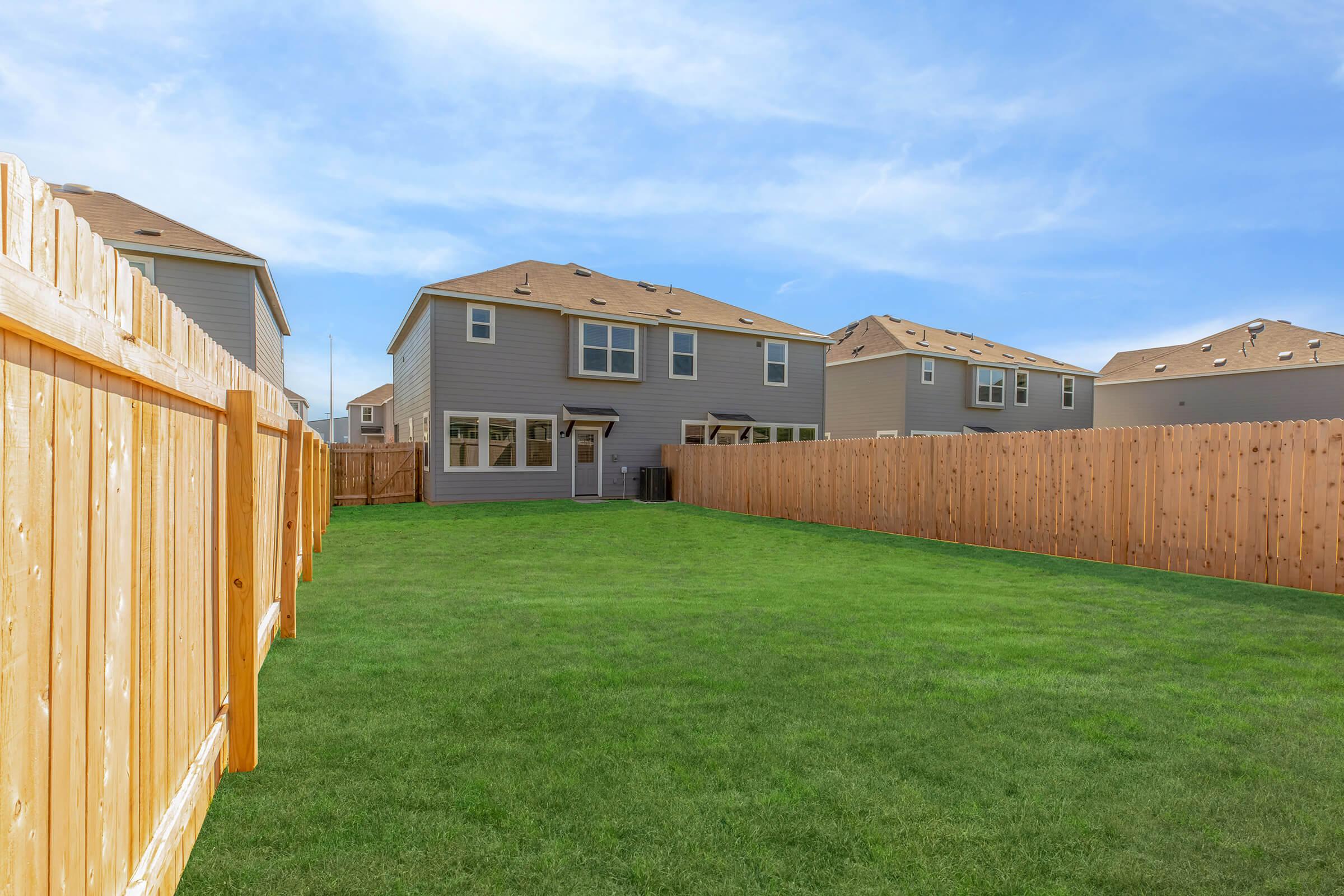 a large lawn in front of a house