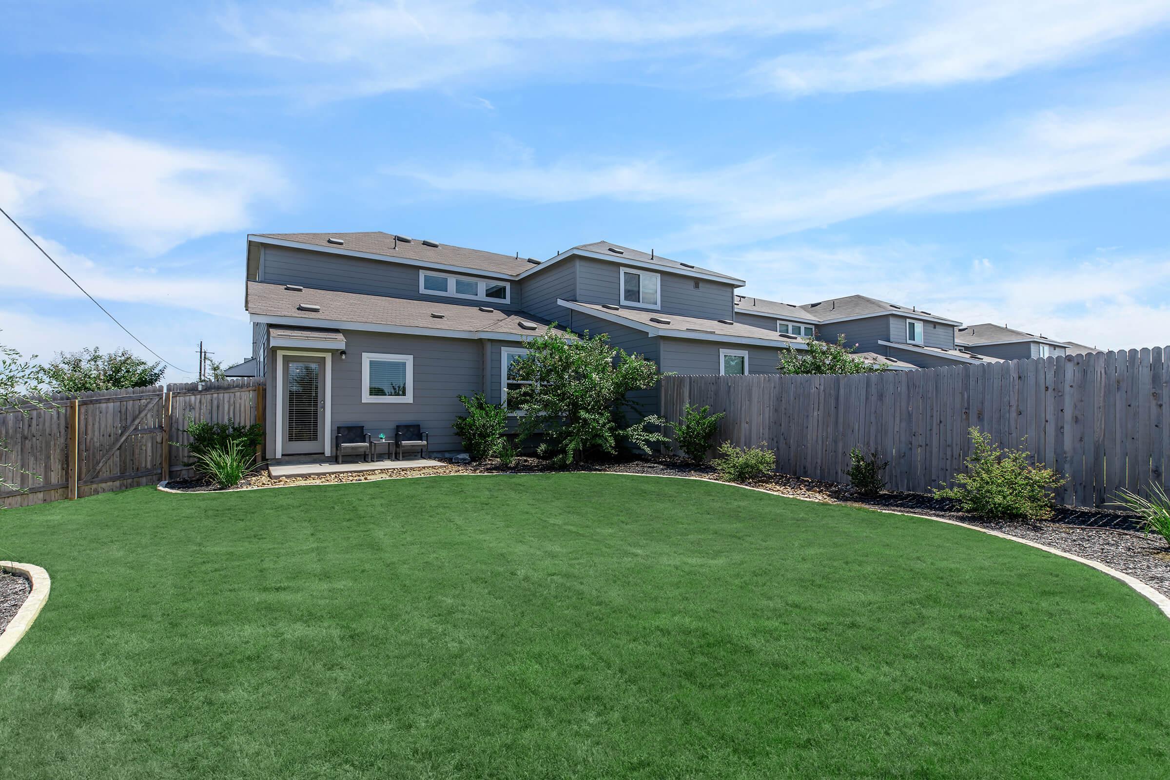 a large lawn in front of a building