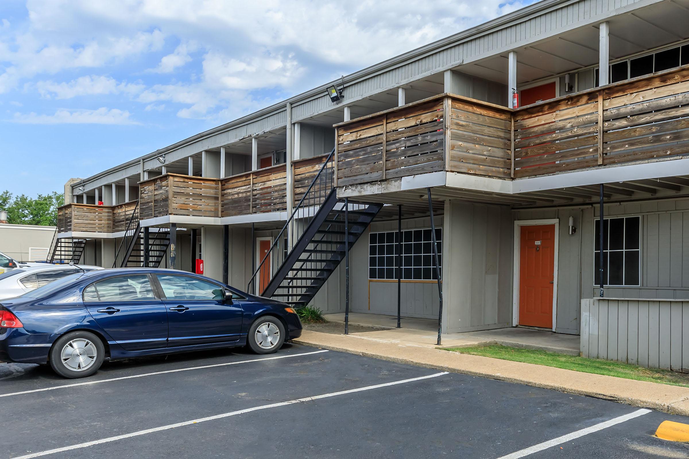 a car parked on the side of a building