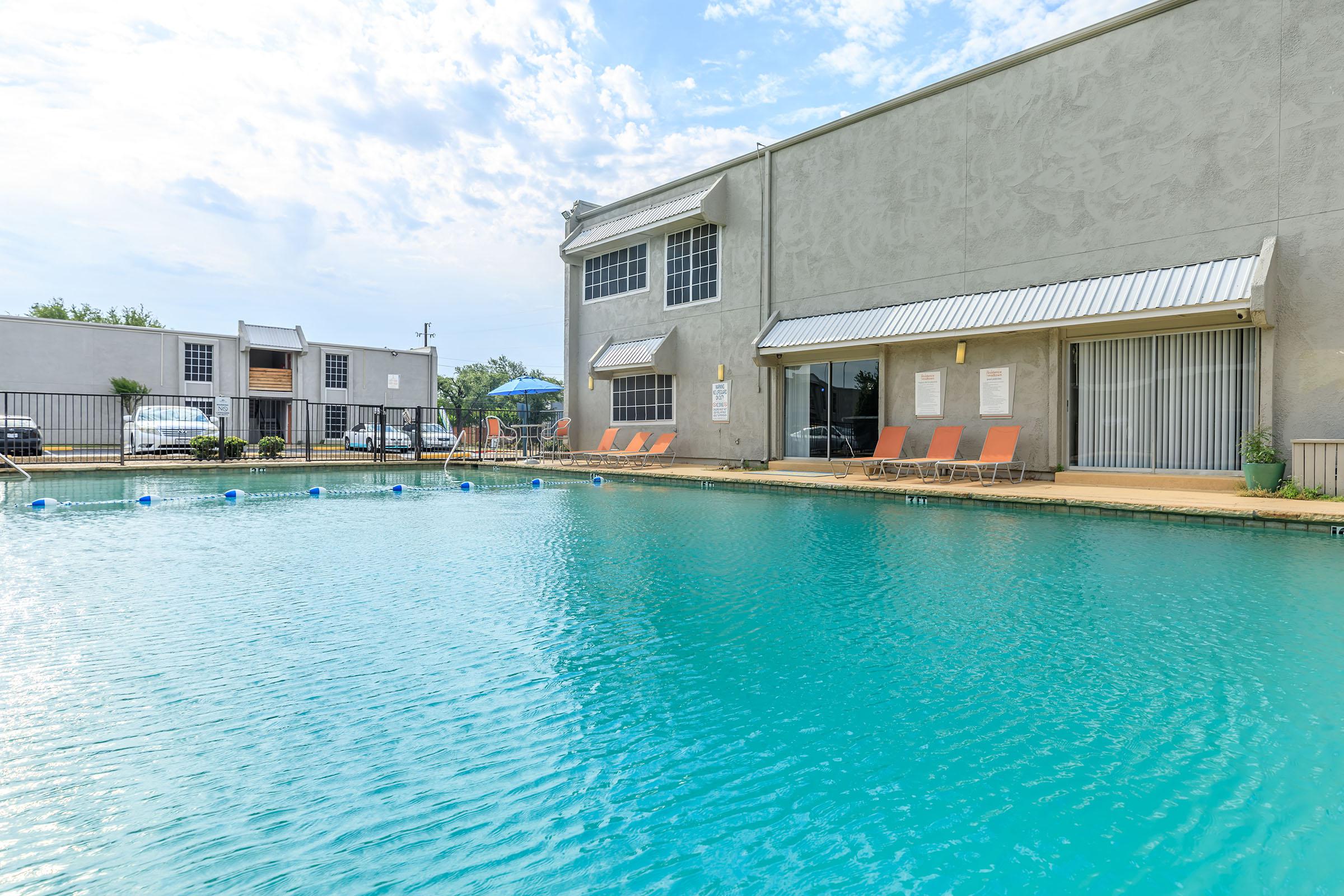 a house with a large pool of water