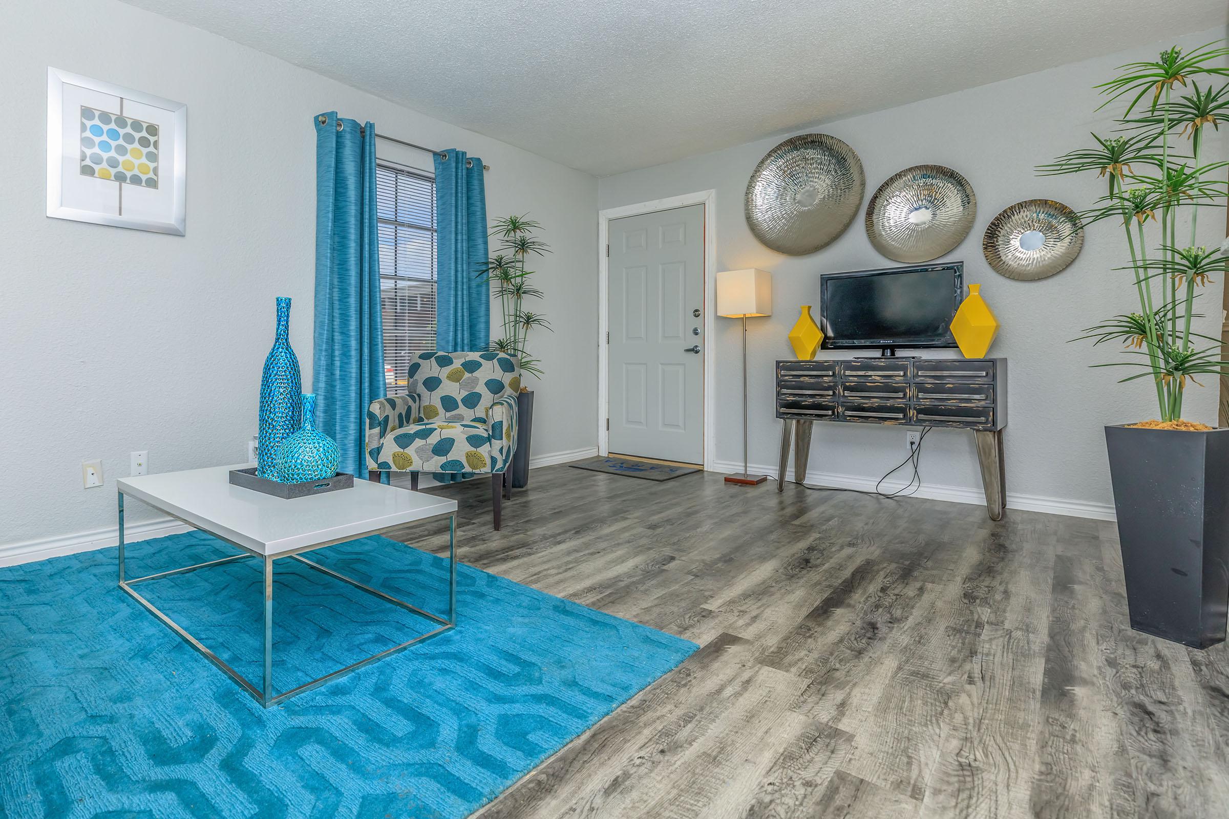 a living room with blue walls