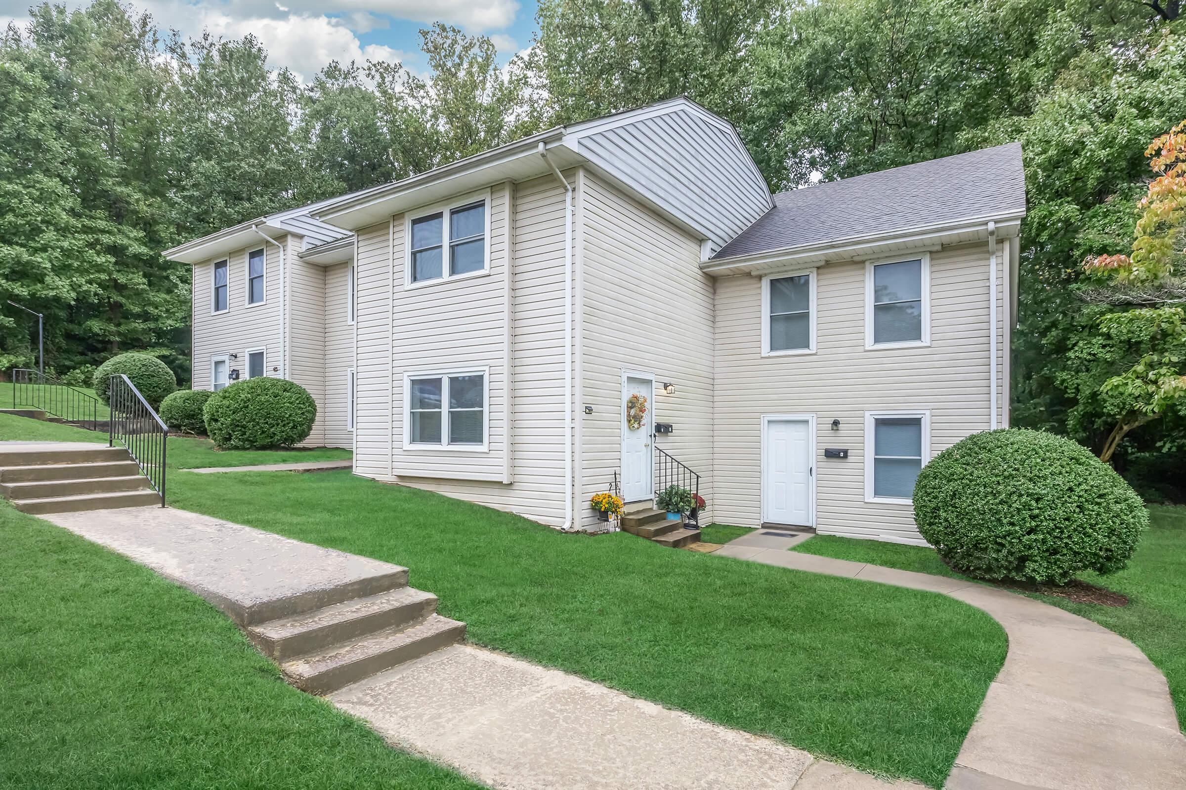 a large lawn in front of a house