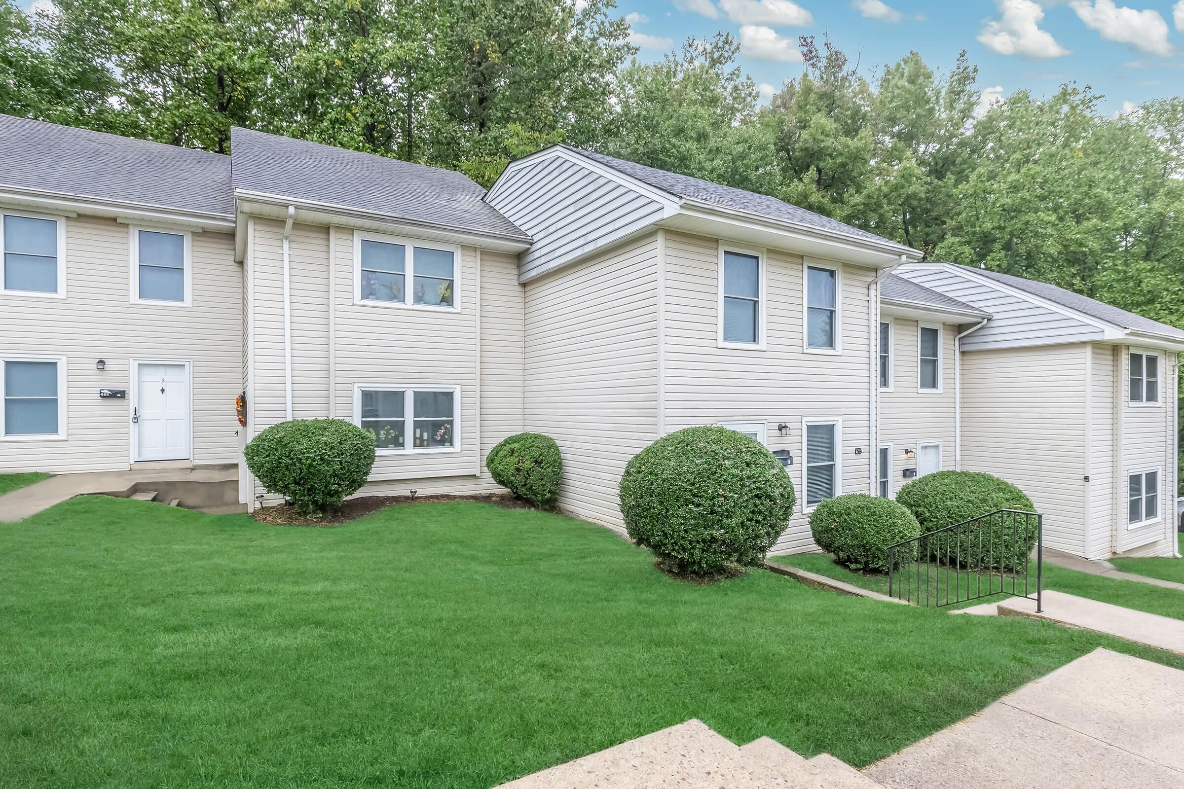 a large lawn in front of a house