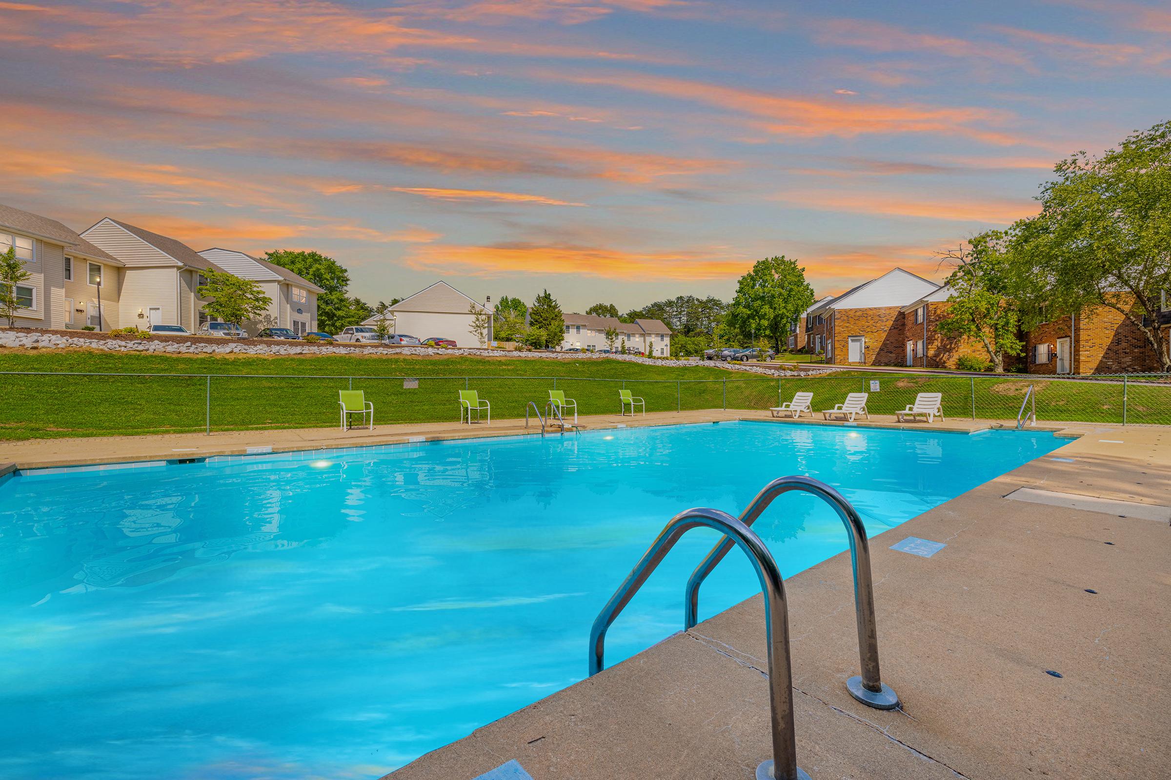 a pool next to a body of water