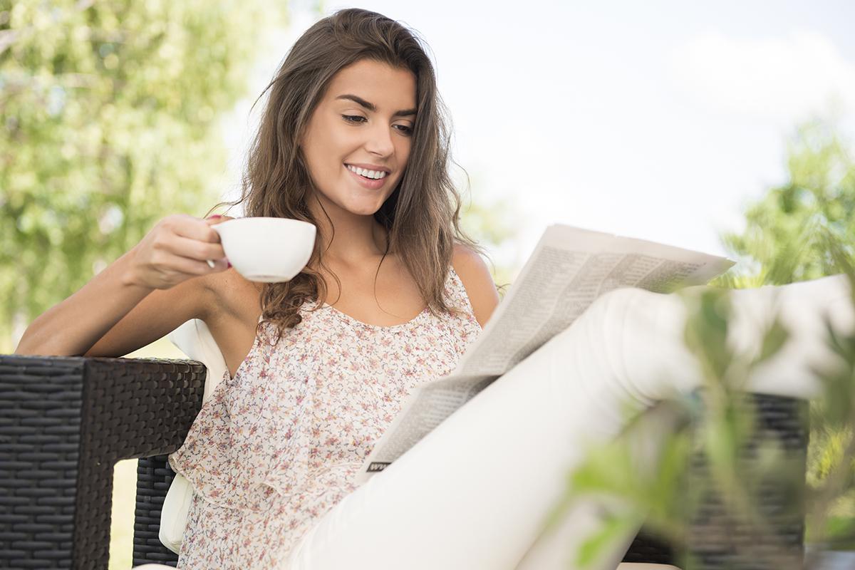 lady drinking coffee outside.jpg