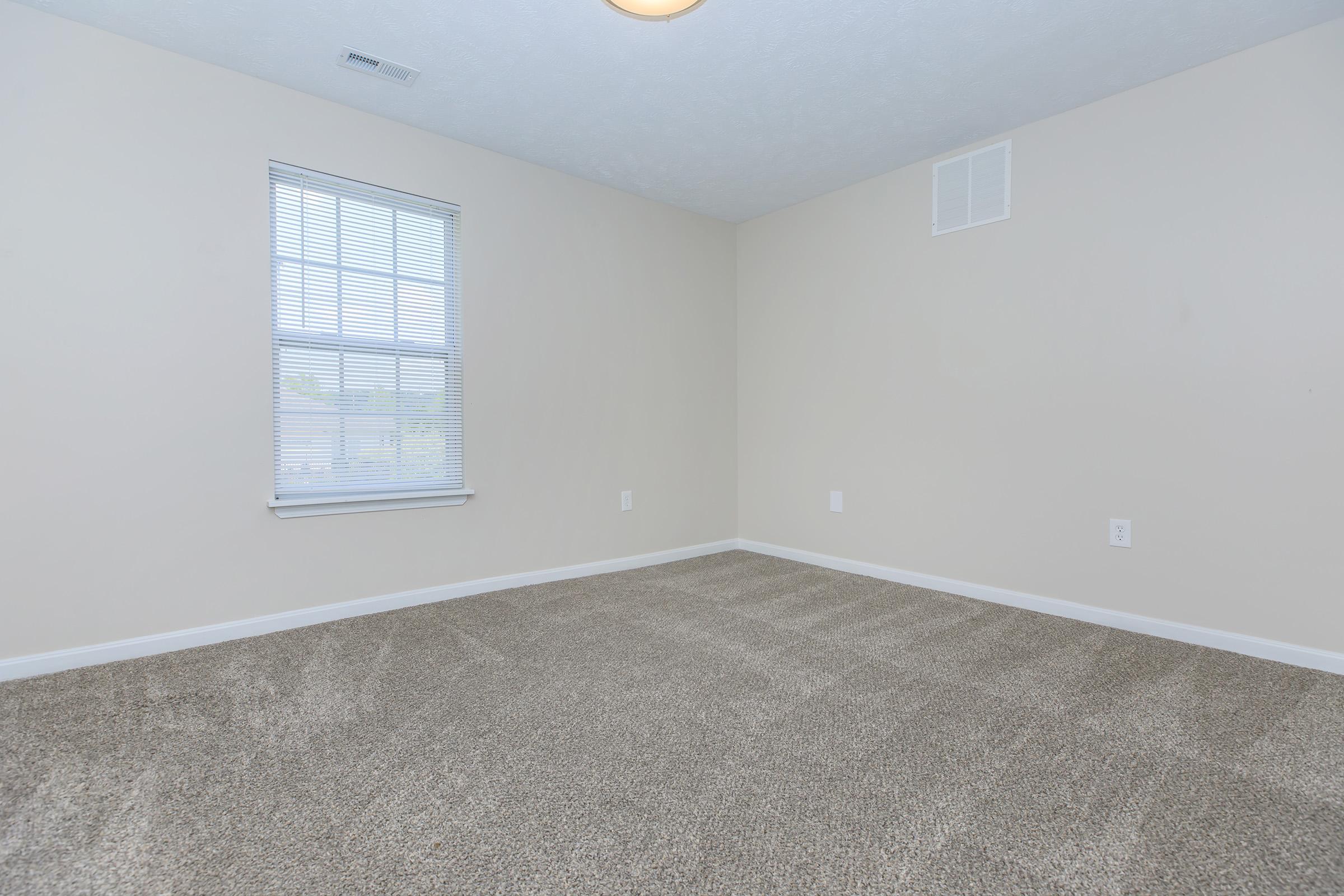 a room with a sink and a window