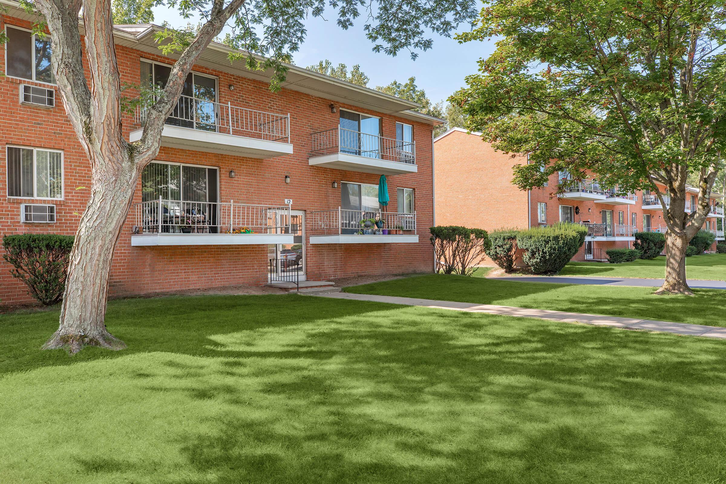 a large lawn in front of a house