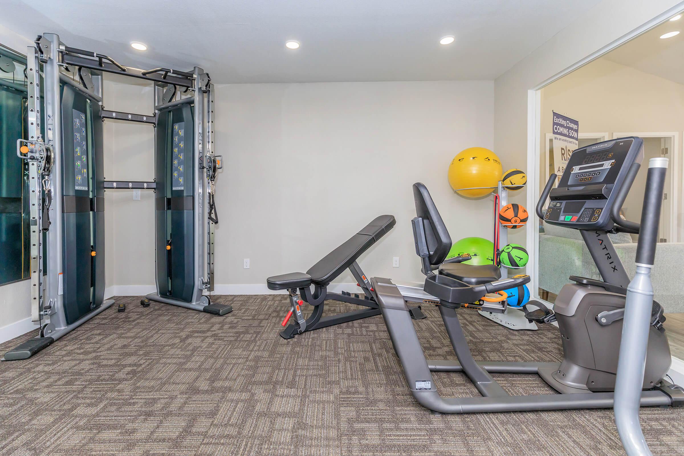 Rise Desert West fitness center and gym with workout equipment and exercise balls