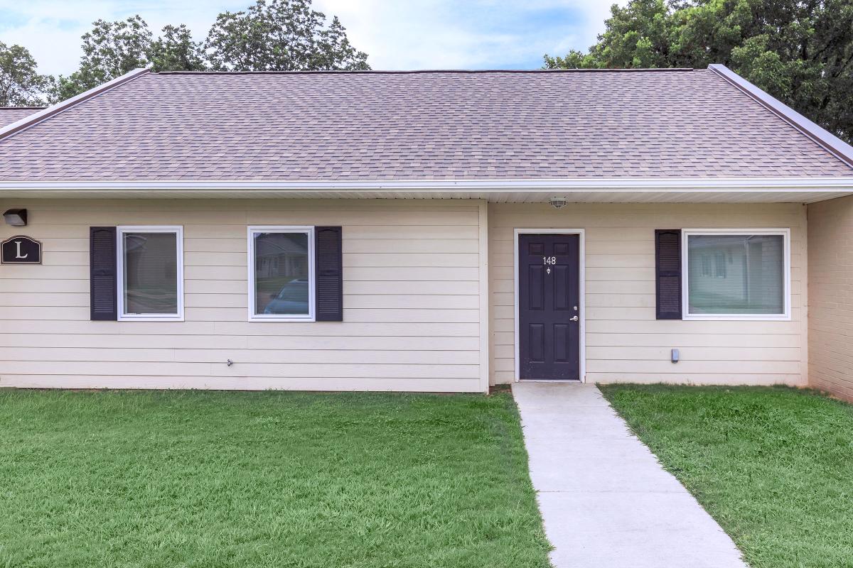 a large lawn in front of a house