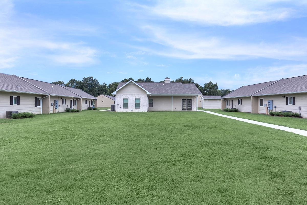 a large lawn in front of a house