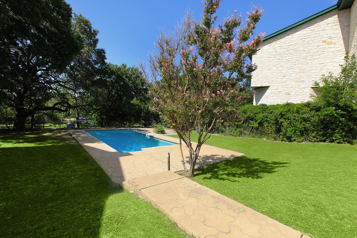 a large lawn in front of a house